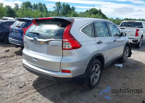 2015 Honda Cr-V Lx z USA, uszkodzony, nr VIN 2HKRM4H31FH615105